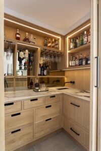 Ligna pantry corner with oak worktops, fitted drawers and storage shelves